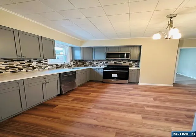 Photo 4 of Single family home for sale at 1 Woodside Ave, Little Falls, NJ 07424 | MLS# 26020433 | Listing updated on 2026-08-28
