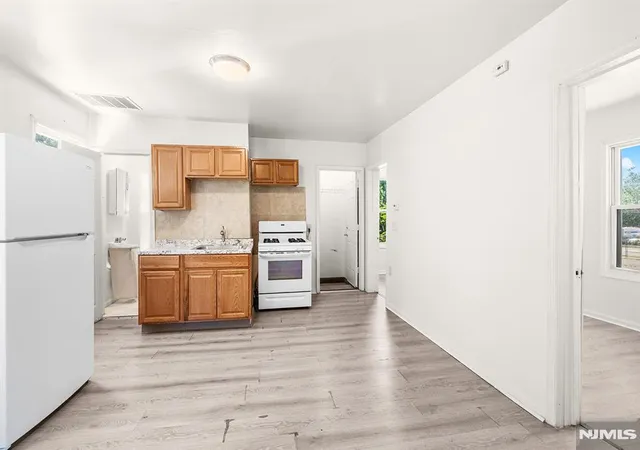 2nd image of 116 118 1st St, Paterson, NJ 07522 | MLS# 26021176
