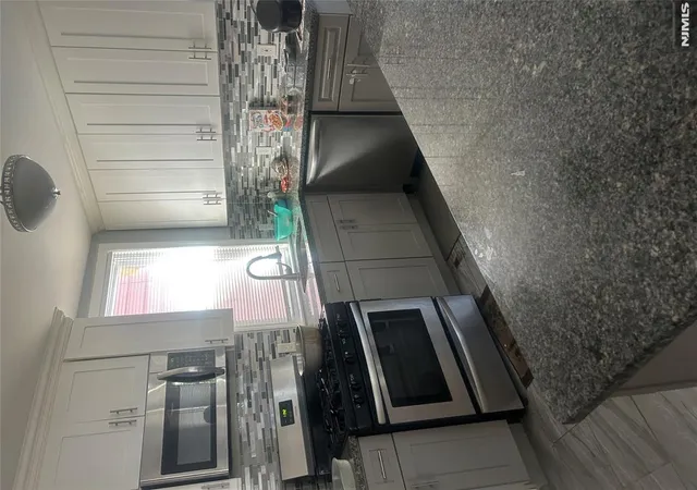 Photo 3 of Single family home for sale at 27 Richelieu Ter, Newark, NJ 07106 | MLS# 26021626 | Listing updated on 2026-07-24