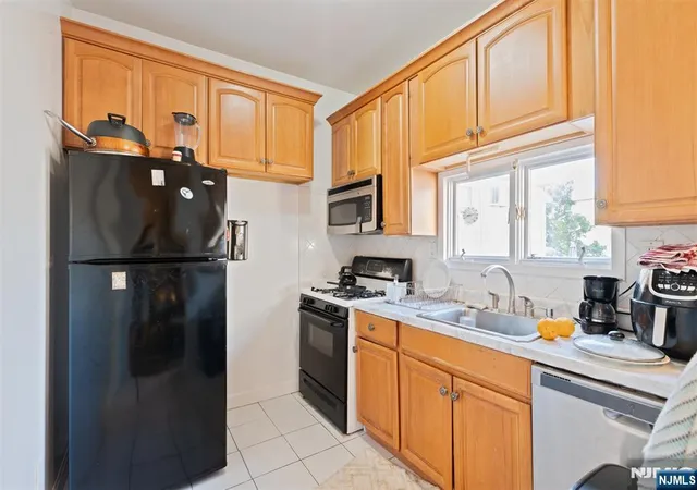 3rd image of 411 Sheridan Pl, Fairview, NJ 07022 | MLS# 26022482