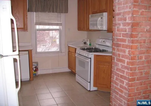 Photo 2 of Multi family home for sale at 313 Madison St, Carlstadt, NJ 07072 | MLS# 26026030 | Listing updated on 2026-08-13