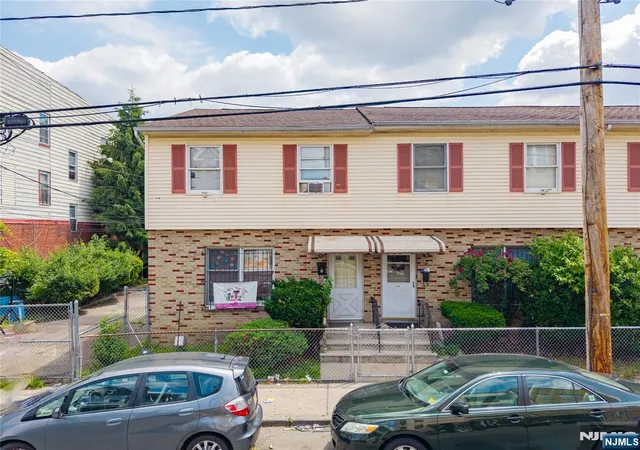 Photo 1 of Townhouse for sale at 265 Rosa Parks Blvd, Paterson, NJ 07501 | MLS# 26030380 | Listing updated on 2026-08-28
