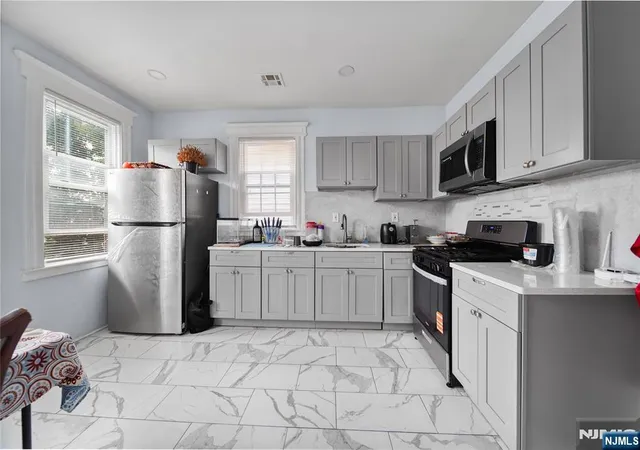 Photo 3 of Multi family home for sale at 18 Ellis Ave, Irvington, NJ 07111 | MLS# 26031339 | Listing updated on 2026-09-04