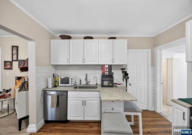 Photo 3 of Single family home for sale at 415-417 Preakness Ave, Paterson, NJ 07502 | MLS# 26032359 | Listing updated on 2026-09-14