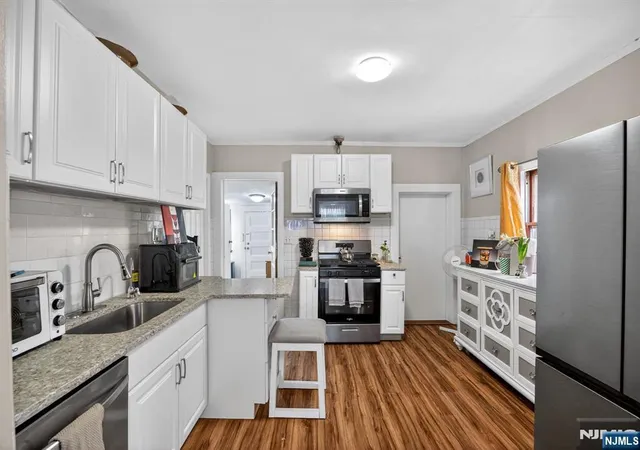 Photo 4 of Single family home for sale at 415-417 Preakness Ave, Paterson, NJ 07502 | MLS# 26032359 | Listing updated on 2026-09-14