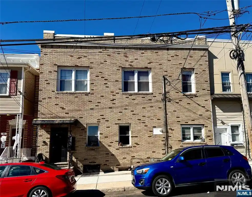 Multi family home for sale at 319 Harrison Ave, Garfield, NJ 07026 | MLS# 26035176