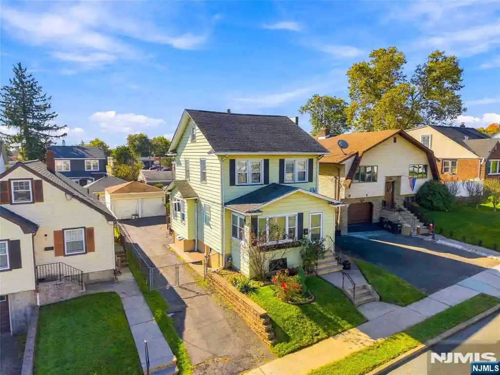 Photo 1 of Single family home for sale at 21 Rollins Ave, Clifton, NJ 07011 | MLS# 26037455 | Listing updated on 2026-10-25