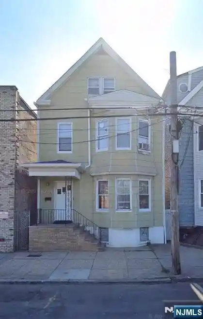 Multi family home for sale at 104 5th Street, Harrison, NJ 07029 | MLS# 26038228