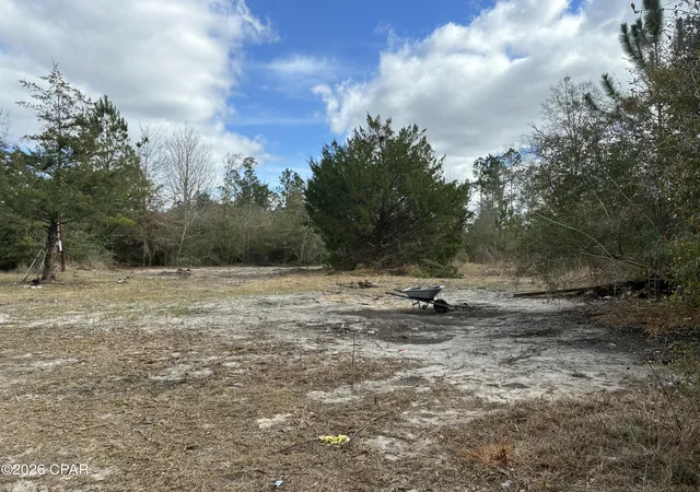 2nd image of 11922 Tammy Pitts Rd, Fountain, FL 32438 | MLS# 785649