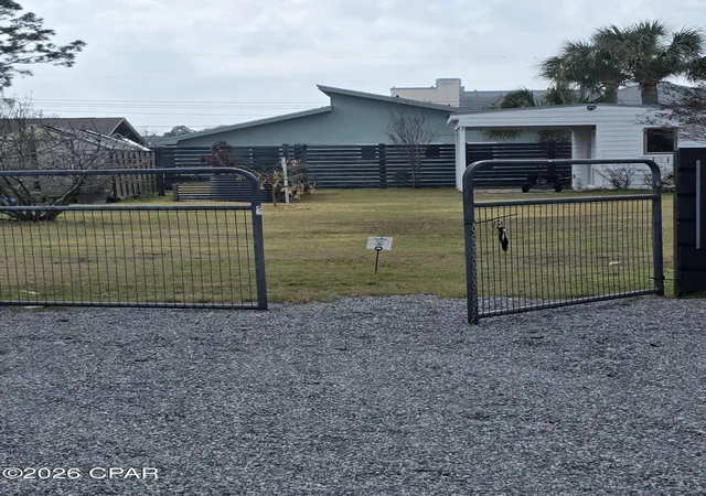 1st image of 5733 S Lagoon Dr, Panama City Beach, FL 32408 | MLS# 786500