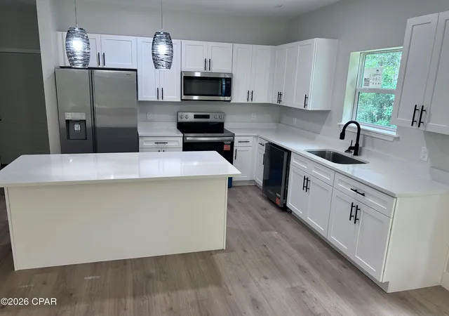 4th image of 169 S Parker St, Wewahitchka, FL 32465 | MLS# 786820