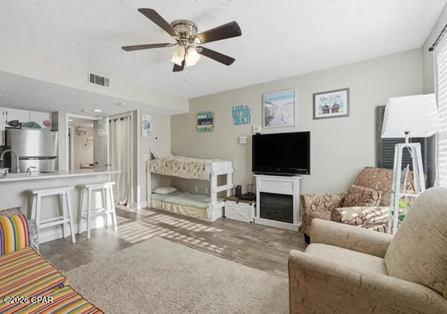 Listing Photo 1 - Condo for sale in building located at 3600 Tiki Dr, Panama City Beach, FL 32408 - Unit #115