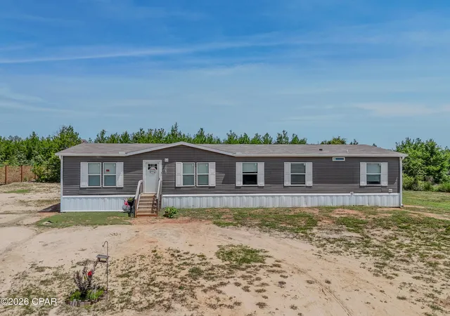 1st image of 8676 Nw County Road 274, Altha, FL 32421 | MLS# 790601