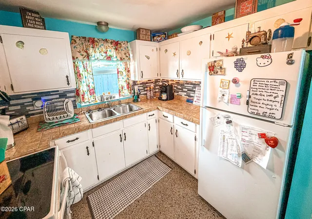 26th image of 5220 Beach Dr, Panama City, FL 32408 | MLS# 790852