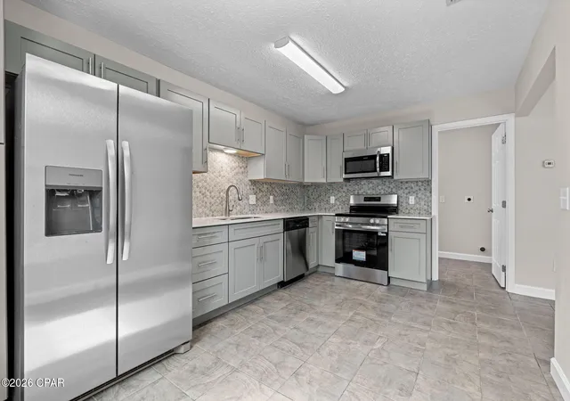Photo 2 of Townhouse for sale at 6716 Olokee St, Panama City, FL 32404 | MLS# 792222 | Listing updated on 2026-07-05