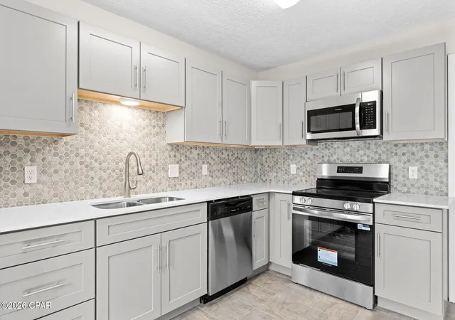 Photo 3 of Townhouse for sale at 6716 Olokee St, Panama City, FL 32404 | MLS# 792222 | Listing updated on 2026-07-05