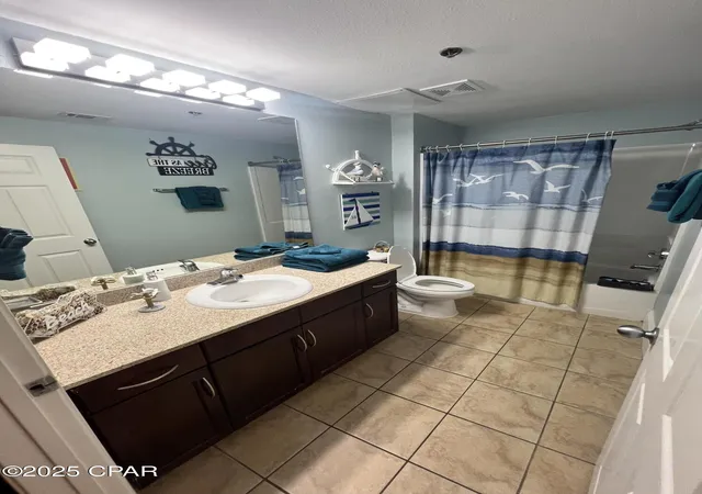 Listing Photo 1 - Condo for sale in building located at 9902 S Thomas Dr, Panama City Beach, FL 32408 - Unit #237