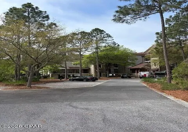 Listing Photo 1 - Condo for sale in building located at 1101 Sawgrass Ct, Panama City Beach, FL 32413 - Unit #102