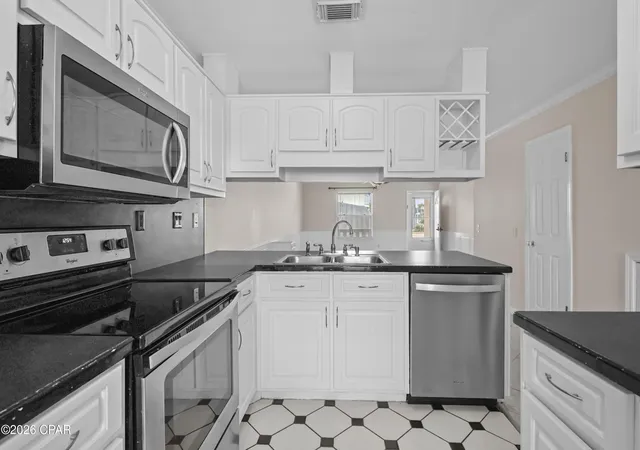 Photo 3 of Townhouse for sale at 6213 S Lagoon Dr #B, Panama City, FL 32408 | MLS# 795747 | Listing updated on 2026-09-28