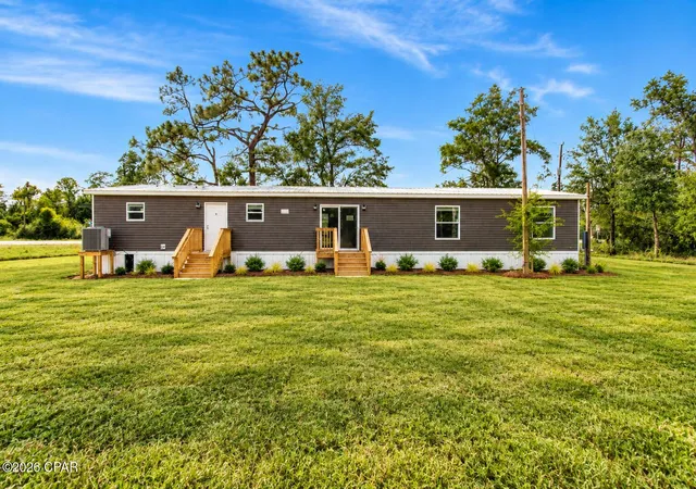 Photo 2 of Manufactured home for sale at 7114 Highway 2301, Panama City, FL 32404 | MLS# 795877 | Listing updated on 2026-09-25