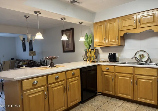 Photo 1 of Townhouse for sale at 6437 Oakshore Dr, Panama City, FL 32404 | MLS# 796311 | Listing updated on 2026-10-05
