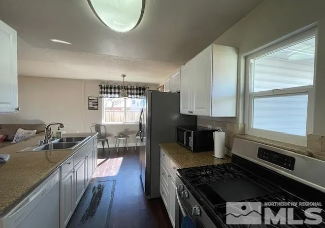 Photo 2 of Single family home for sale at 7411 Essex Way, Reno, NV 89506 | MLS# 250003383 | Listing updated on 2026-01-11