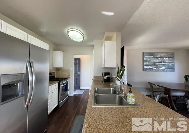 Photo 3 of Single family home for sale at 7411 Essex Way, Reno, NV 89506 | MLS# 250003383 | Listing updated on 2026-01-11