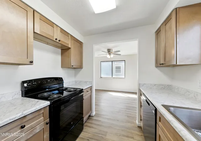 Photo 3 of Townhouse for sale at 718 Travis Dr #D, Carson City, NV 89701 | MLS# 250051271 | Listing updated on 2026-09-30