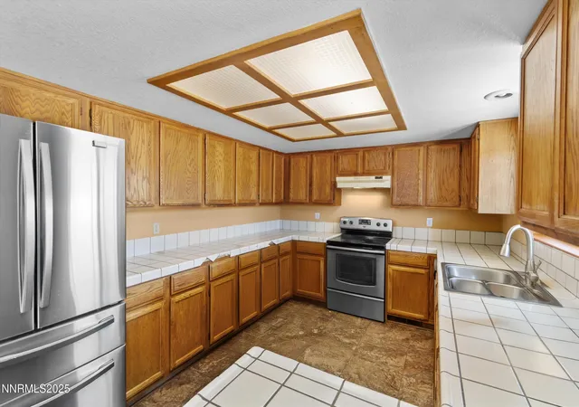 Photo 4 of Single family home for sale at 15500 Elkhorn Ln, Reno, NV 89506 | MLS# 250052890 | Listing updated on 2025-11-12