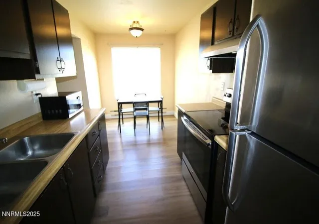 Listing Photo 5 - Condo for sale in building located at 3935 Clear Acre Ln, Reno, NV 89512 - Unit #209