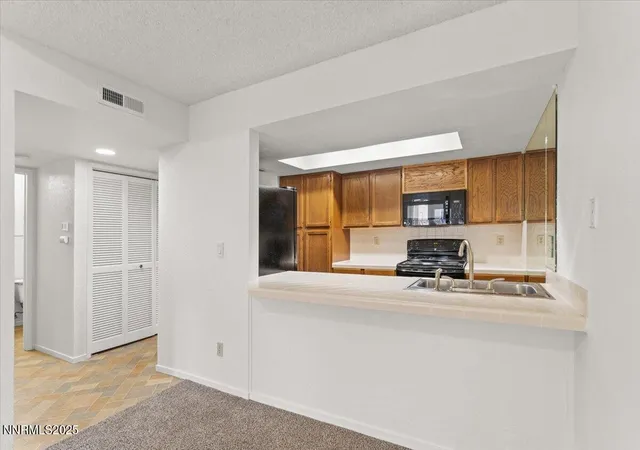 Photo 3 of Townhouse for sale at 8620 Dixon Ln, Reno, NV 89511 | MLS# 250056750 | Listing updated on 2025-10-15