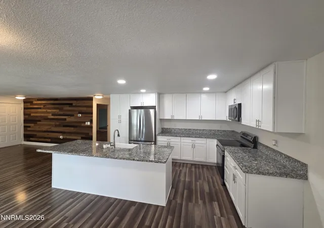 Photo 2 of Single family home for sale at 1055 Tudor Ct, Reno, NV 89503 | MLS# 260008247 | Listing updated on 2026-09-07