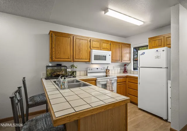 Listing Photo 5 - Condo for sale in building located at 1466 Selmi Dr, Reno, NV 89512