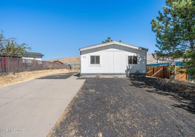 Photo 2 of Manufactured home for sale at 213 E Miriam Way, Mound House, NV 89706 | MLS# 260008944 | Listing updated on 2026-08-26