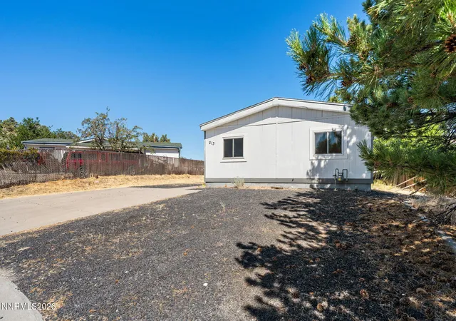 Photo 3 of Manufactured home for sale at 213 E Miriam Way, Mound House, NV 89706 | MLS# 260008944 | Listing updated on 2026-08-26