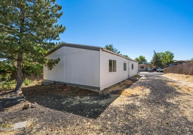 Photo 3 of Manufactured home for sale at 213 E Miriam Way, Mound House, NV 89706 | MLS# 260008944 | Listing updated on 2026-08-26
