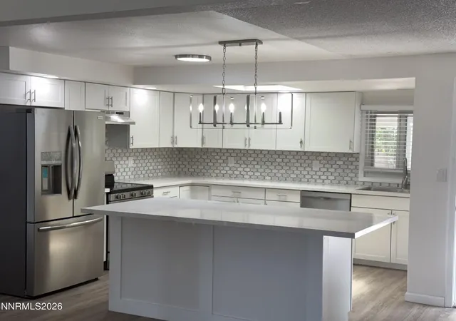 Photo 3 of Single family home for sale at 580 E Huffaker Ln, Reno, NV 89511 | MLS# 260010495 | Listing updated on 2026-08-20