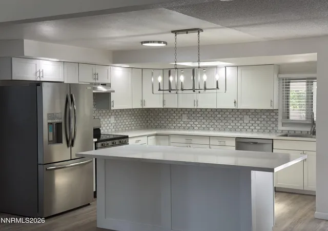 Photo 3 of Single family home for sale at 580 E Huffaker Ln, Reno, NV 89511 | MLS# 260010495 | Listing updated on 2026-09-28