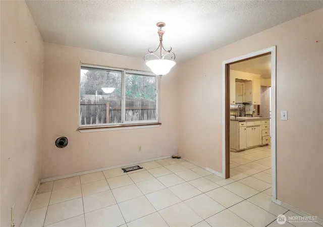 Photo 4 of Sale Pending at 1620 E Columbia Ave, Tacoma, WA 98404 | MLS# NWM2465548 | Listing updated on 2026-09-25