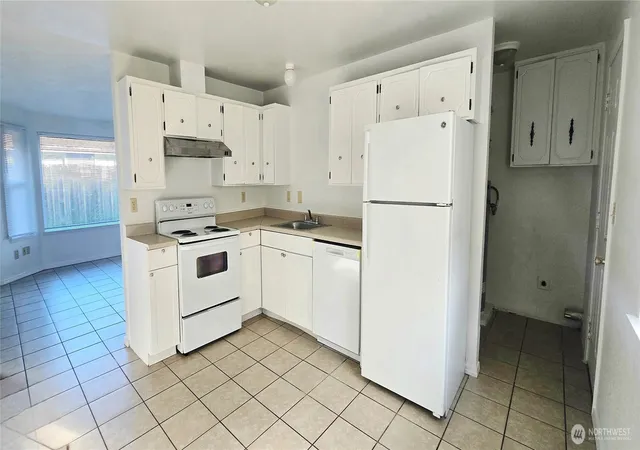 Photo 4 of Multi family home for sale at 6905 S Madison, Tacoma, WA 98409 | MLS# NWM2467036 | Listing updated on 2026-06-12