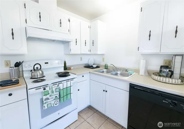 Photo 2 of Multi family home for sale at 6909 S Madison, Tacoma, WA 98409 | MLS# NWM2467079 | Listing updated on 2026-06-12