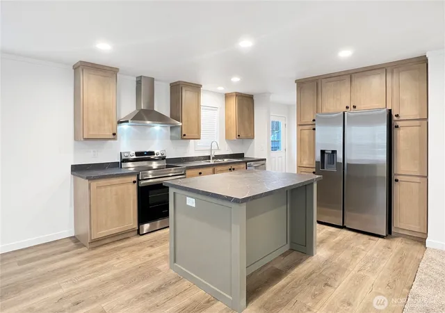 Photo 3 of Manufactured home for sale at 10900 Kuhlman Rd SE #84, Olympia, WA 98513 | MLS# NWM2476192 | Listing updated on 2026-09-28