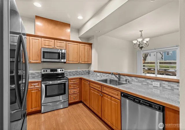 Photo 2 of Condo for sale at 10700 Se 260th Street #A103, Kent, WA 98030 | MLS# NWM2502657 | Listing updated on 2026-09-21