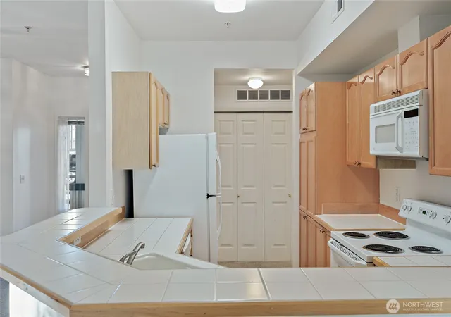 Photo 4 of Condo for sale at 12122 NE 171st Place #D201, Bothell, WA 98011 | MLS# NWM2504485 | Listing updated on 2026-08-16