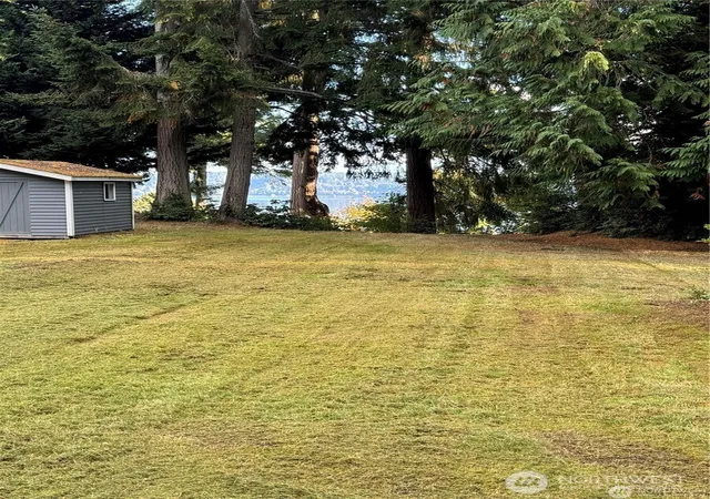 Photo 2 of Land for sale at 10911 Seaview Dr, Anderson Island, WA 98303 | MLS# NWM2505139 | Listing updated on 2026-09-21