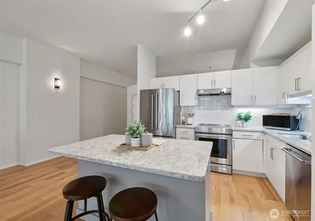 Photo 4 of Condo for sale at 526 1st Avenue S #405, Seattle, WA 98104 | MLS# NWM2506996 | Listing updated on 2026-09-21