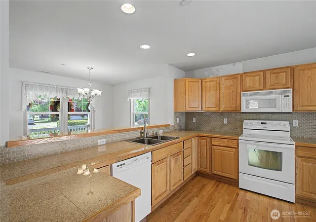 Photo 3 of Single family home for sale at 1242 Griggs St, Dupont, WA 98327 | MLS# NWM2507352 | Listing updated on 2026-09-25