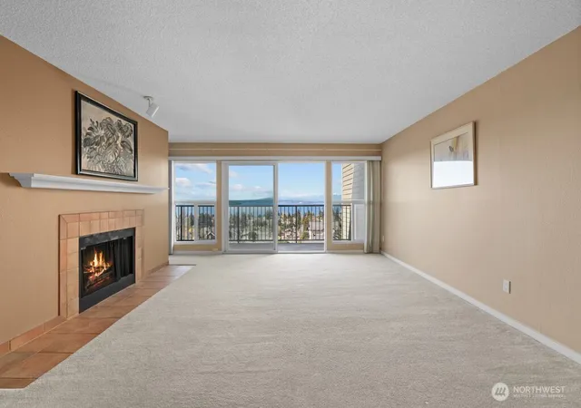 Photo 3 of Condo for sale at 5025 California Ave SW #402, Seattle, WA 98136 | MLS# NWM2507355 | Listing updated on 2026-09-21