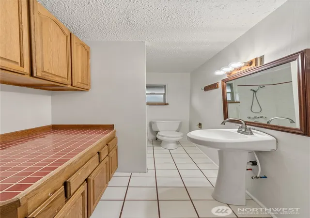 Photo 3 of Multi family home for sale at 107 W 4th Street, Aberdeen, WA 98520 | MLS# NWM2507715 | Listing updated on 2026-09-21