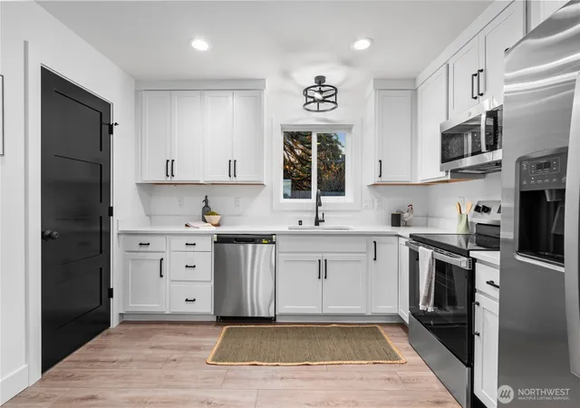 Photo 4 of Townhouse for sale at 9731 13th Avenue NW, Seattle, WA 98117 | MLS# NWM2508645 | Listing updated on 2026-09-21